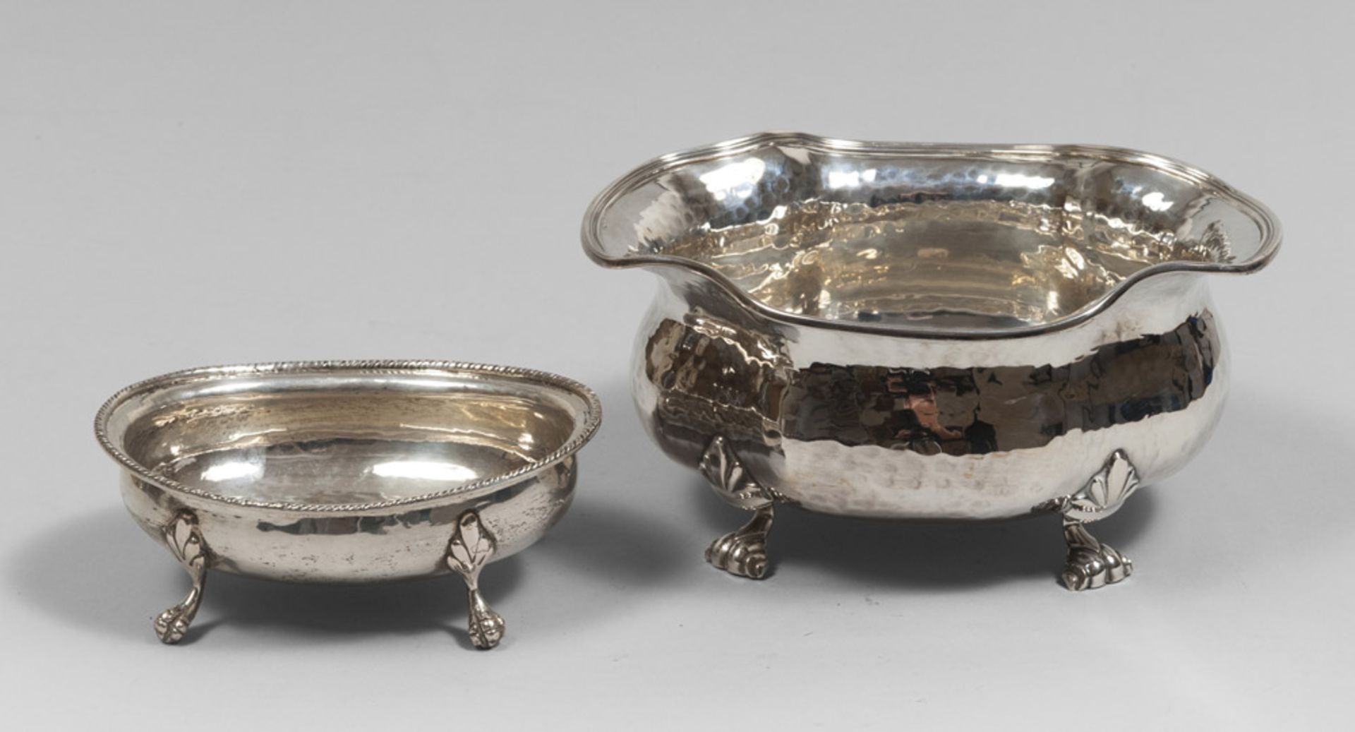 TWO SILVER BOWLS, 20TH CENTURY. Measures maximum cm. 11 x 18 x 21, general weight gr. 679. DUE