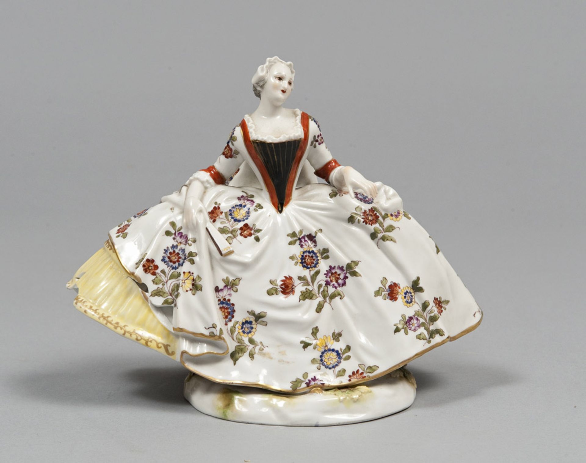 PORCELAIN FIGURE OF DANCER, GINORI LATE 19TH CENTURY of polychrome enamel with wide dress and