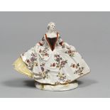 PORCELAIN FIGURE OF DANCER, GINORI LATE 19TH CENTURY of polychrome enamel with wide dress and