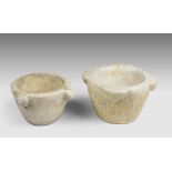 TWO SMALL MORTARS IN MARBLE, 18TH CENTURY Measures cm. 13 x 21 and cm. 10 x 18. Lack. DUE PICCOLI