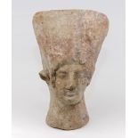 ETRUSCAN VOTIVE FEMALE HEAD, 6TH-5TH CENTURY B.C. Measures cm. 25 x 15. TESTA FEMMINILE VOTIVA,