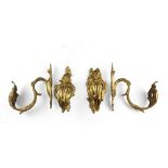 TWO PAIRS OF CURTAIN RODS, 19TH CENTURY in ormolu, with leaves endings. Measures cm. 20 x 7 x 17.