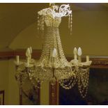 HANGED CHANDELIER, 19TH CENTURY with rows of little spheres in grinded glass and crown of eight