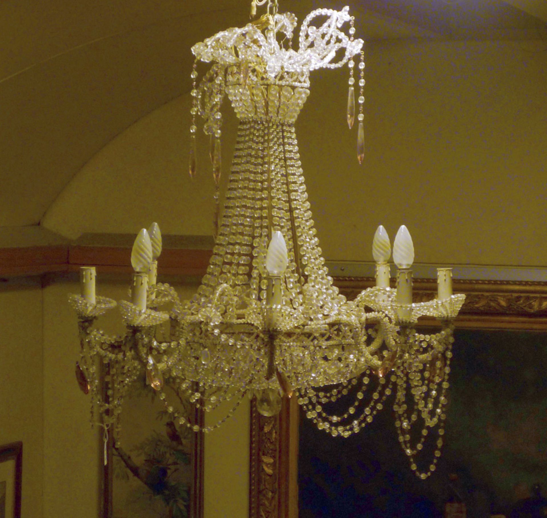 HANGED CHANDELIER, 19TH CENTURY with rows of little spheres in grinded glass and crown of eight