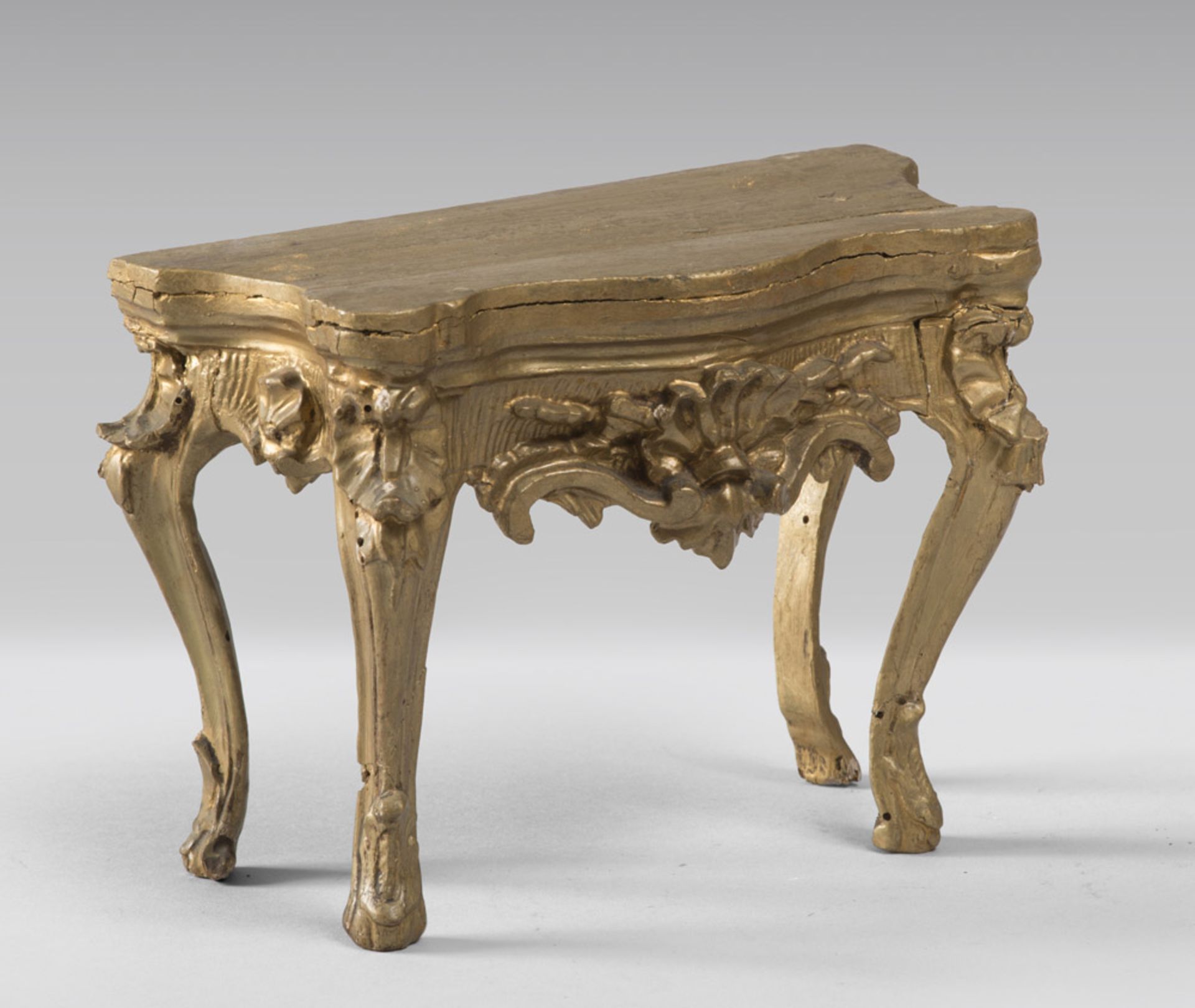 MODEL OF GILT WOOD CONSOLLE, ELEMENTS OF THE 18TH CENTURY carved to leaves, spirals and