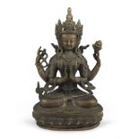 A BURNISHED BRONZE SCULPTURE, TIBET, LATE 19TH - EARLY 20TH CENTURY