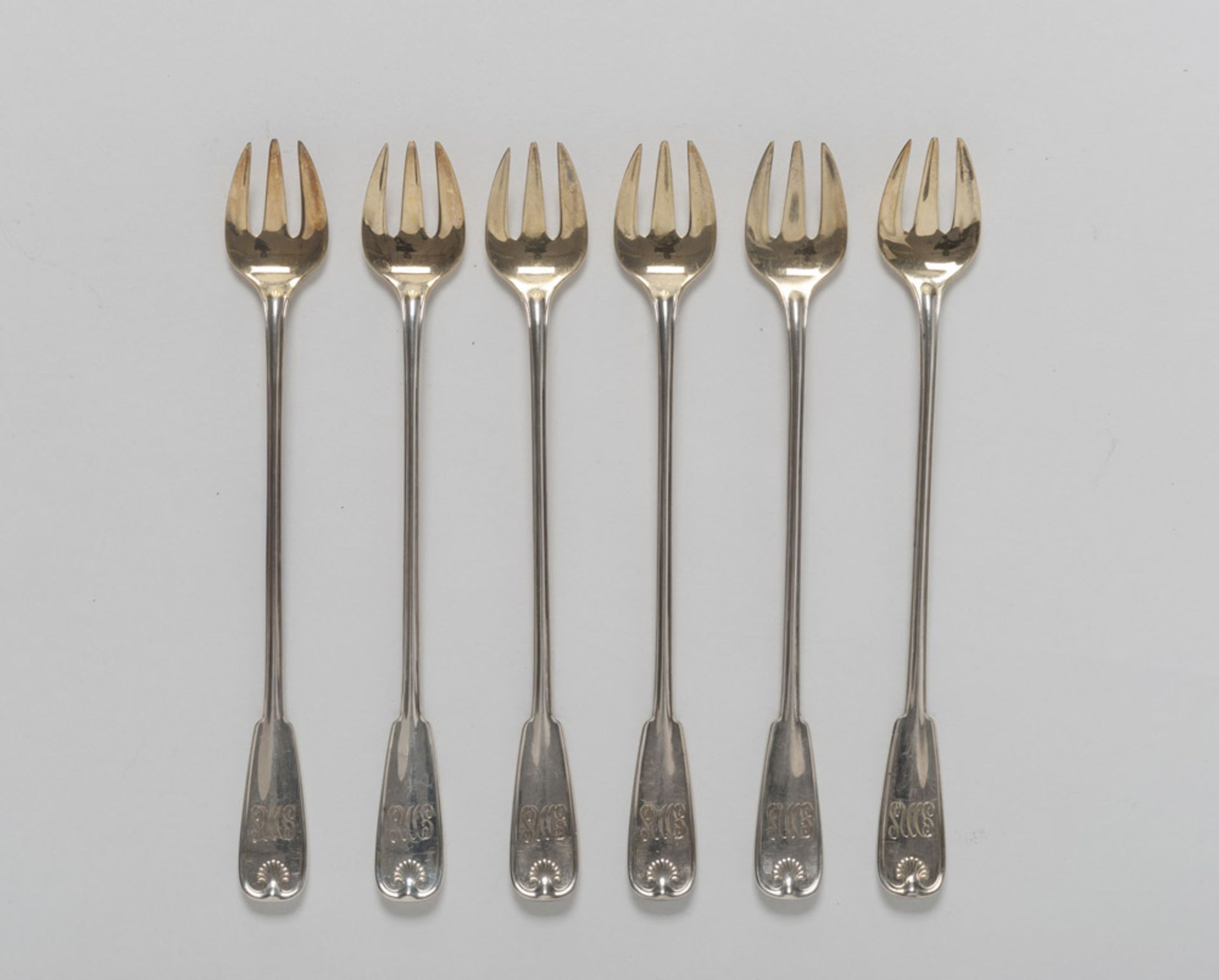 EIGHTEEN SMALL SILVER FORKS, PUNCH TIFFANY & CO. BROADWAY LATE 19TH CENTURY with gilt tridents and