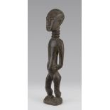 WOODEN ANCESTOR'S FIGURE, YORUBA, NIGERIA EARLY 20TH CENTURY