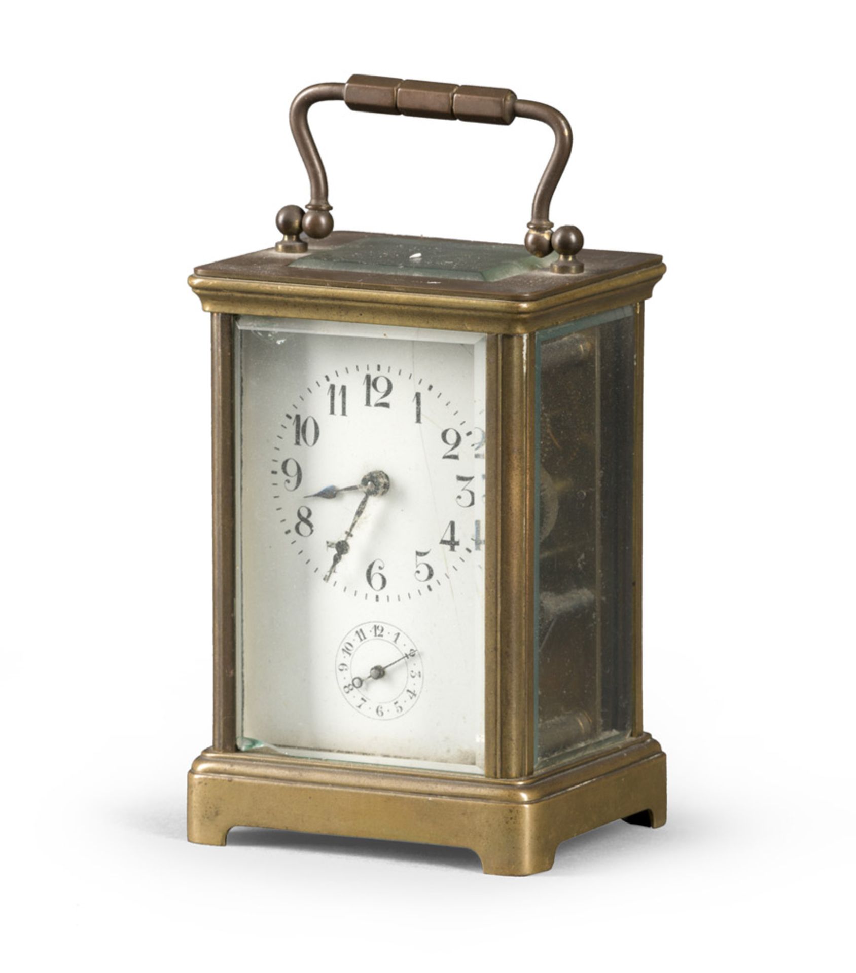 Brass clock with polished glass, early 20th century. Measures cm. 10 x 9 x 7. CAPPUCCINA IN