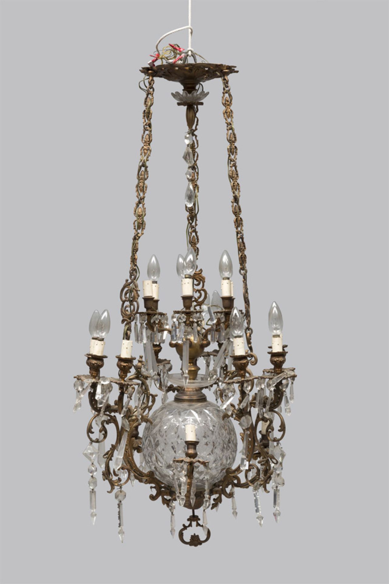 UNUSUAL BRONZE CHANDELIER, FIRST HALF OF 20TH CENTURY with triple series of three arms, centered