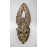 TWO WOODEN BAOULE' MASKS, IVORY COAST 20TH CENTURY