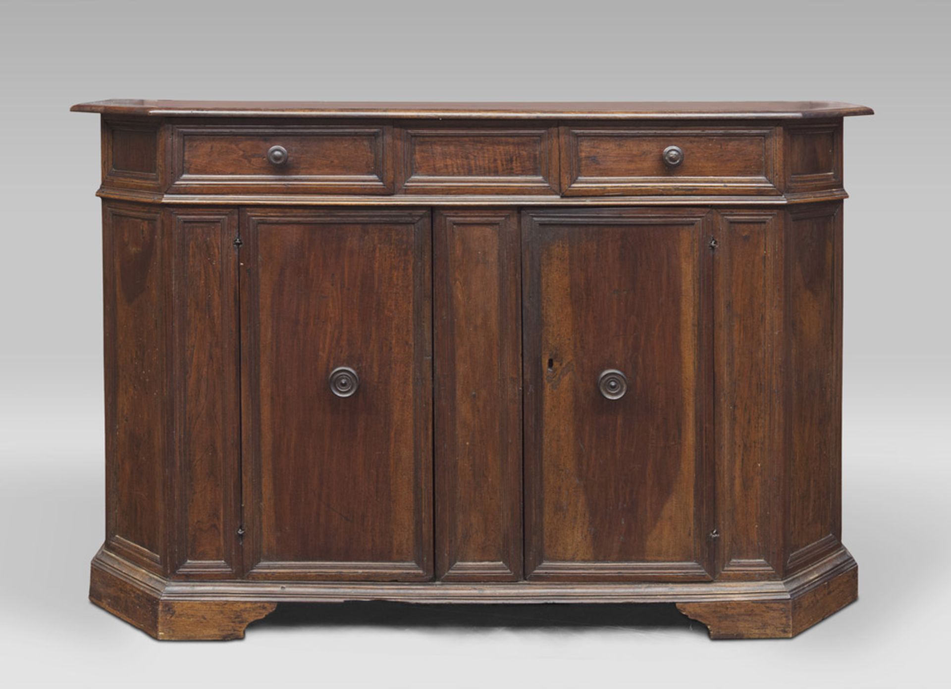 A WALNUT CUPBOARD, ITALY CENTRAL 18TH CENTURY of two drawers and two doors. Measures cm. 118 x 190 x