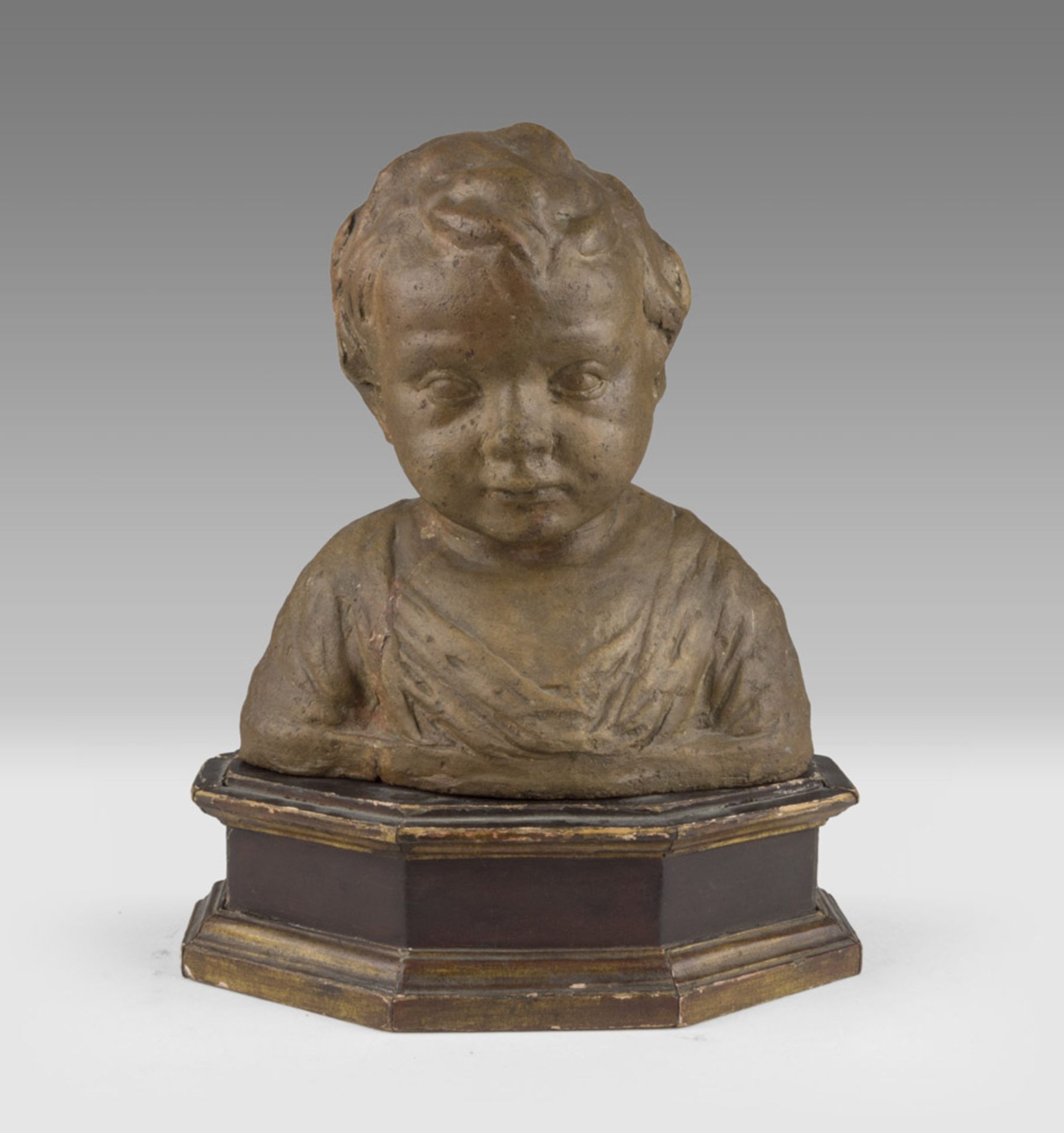 NEAPOLITAN SCULPTOR, 17TH CENTURY CHILD'S BUST Earthenware, cm. 29 x 26 x 15 Coeval basement in