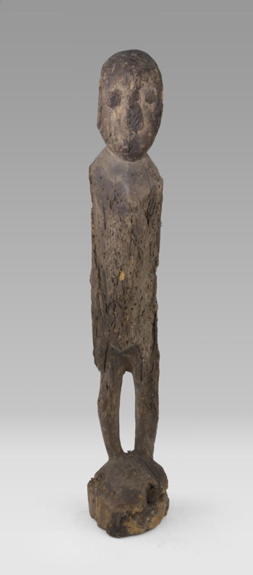 A LOBI CARVED WOOD SCULPTURE OF ANCESTOR. BURKINA FASO, END 19TH CENTURY