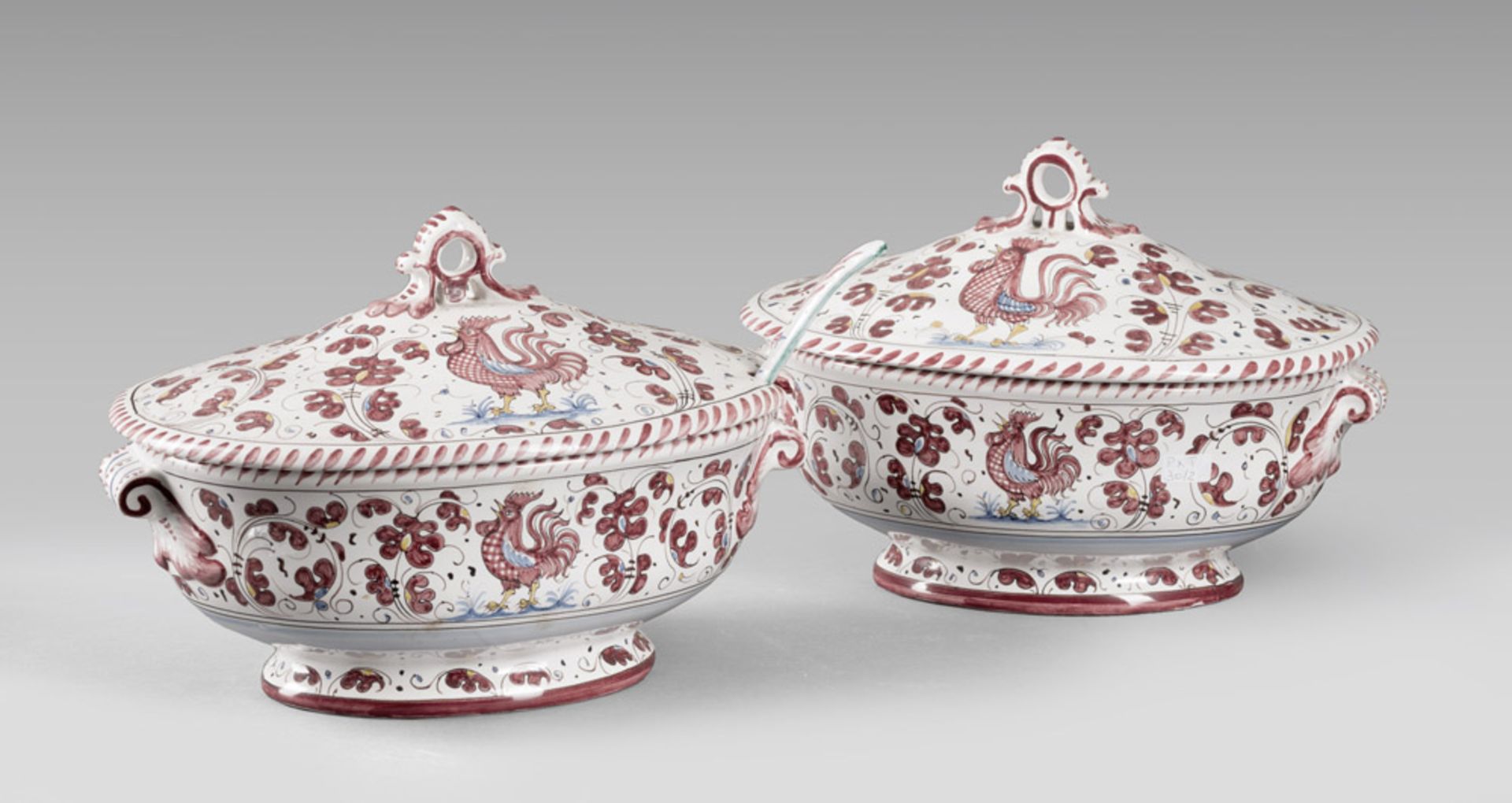 A PAIR OF MAIOLICA TUREENS, GRAZIA DERUTA 20TH CENTURY. Measures cm. 27 x 37 x 27. COPPIA DI