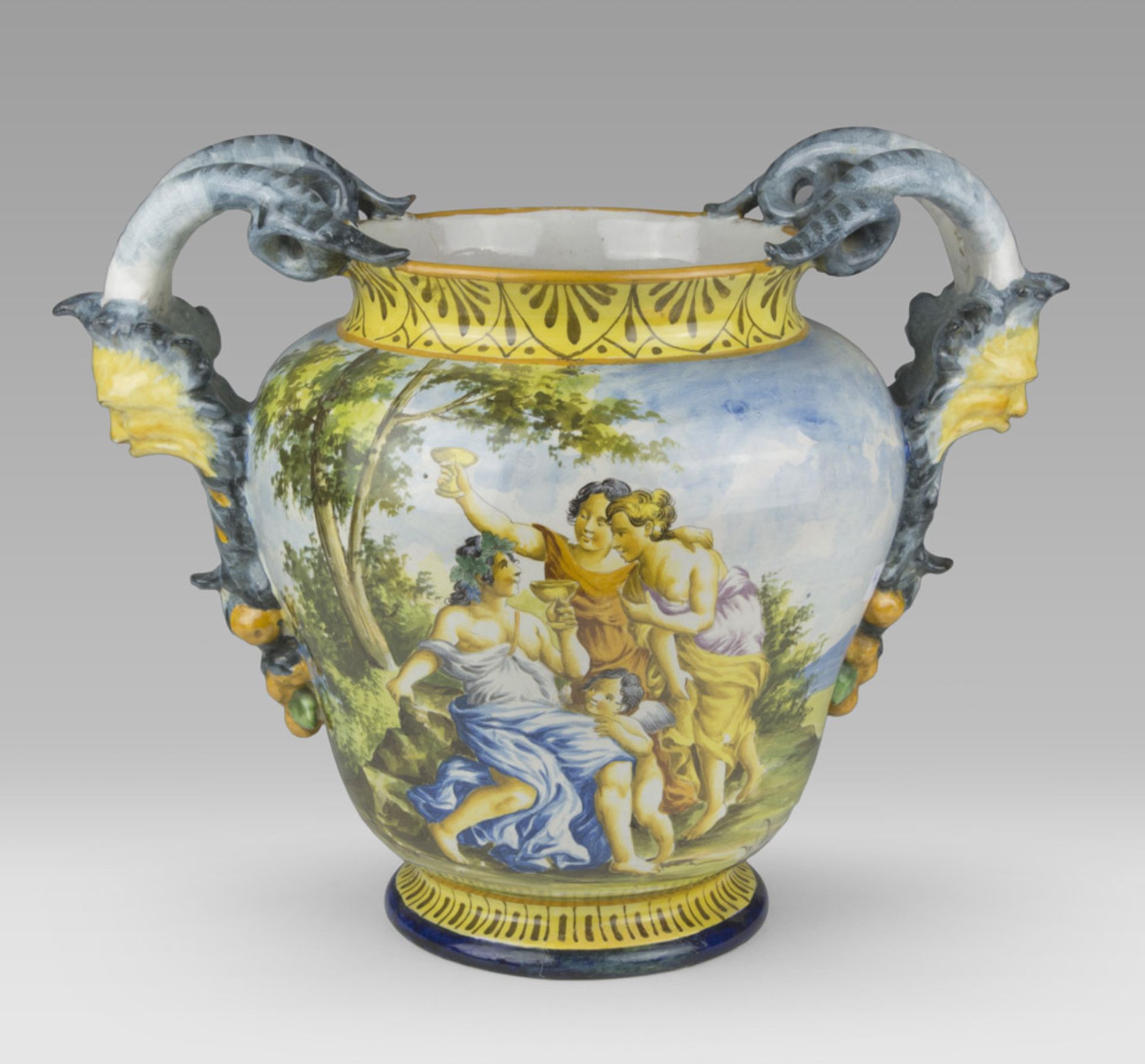 CERAMIC VASE, PROBABLY CASTELLI, EARLY 20TH CENTURY polychrome enamels, centered by bacchic.