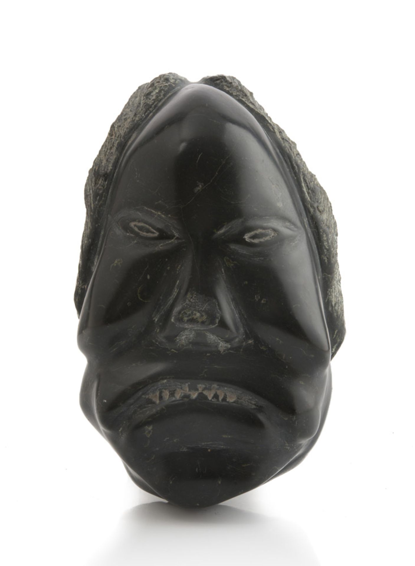 A SOAPSTONE SCULPTURE OF A FACE, ESKIMO ART 20TH CENTURY