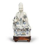 A CHINESE BLUE AND WHITE PORCELAIN SCULPTURE, DEPICTING LAO SHOUXING, FIRST HALF 20TH CENTURY.