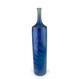 VASO DI CARLO ZAULI (Faenza 1926-2002), ANNI '50 in ceramica invetriata blu, con corpo cilindrico