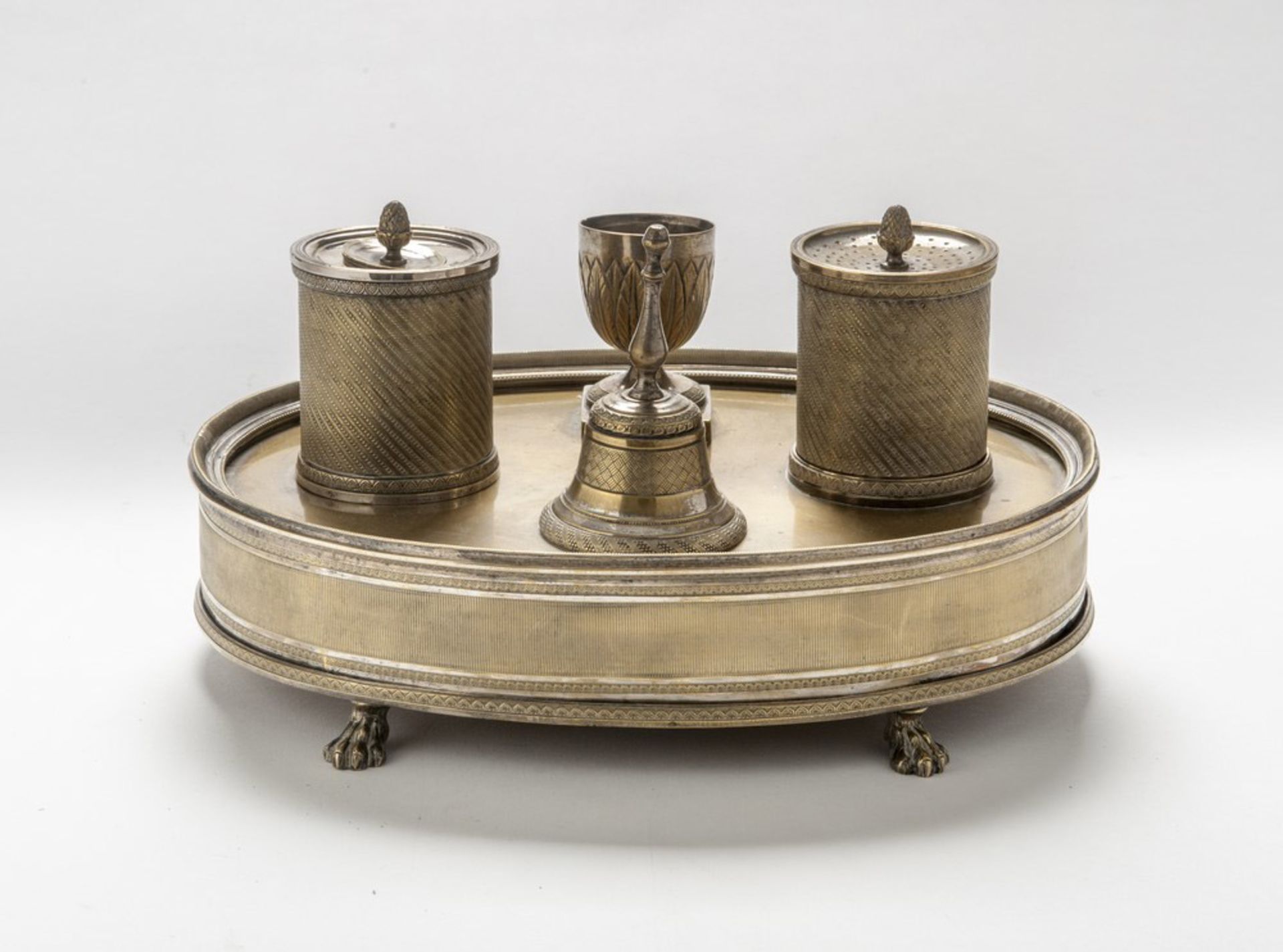 SILVER-PLATED INKWELL, 19TH CENTURY of oval shape with two cylindrical containers, small basin and