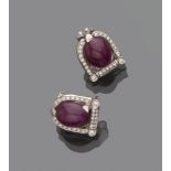 A PAIR OF EARRINGS in white gold 18 kts., bell shape with rubies cabochon and diamonds of contour.