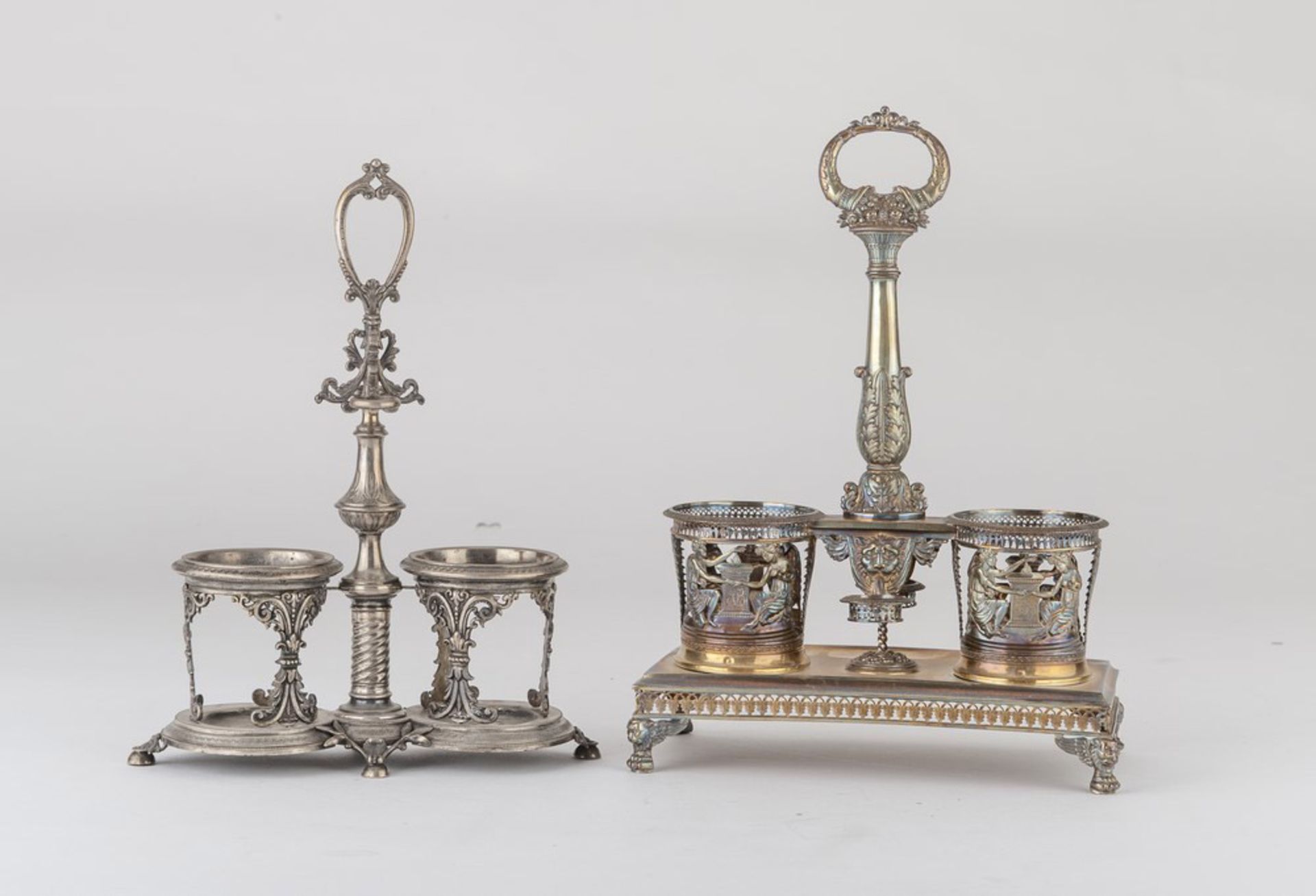 TWO SILVER OIL-CRUETS IN, PUNCH PARIS 1819/1838 with pierced basins, one of them with mythological