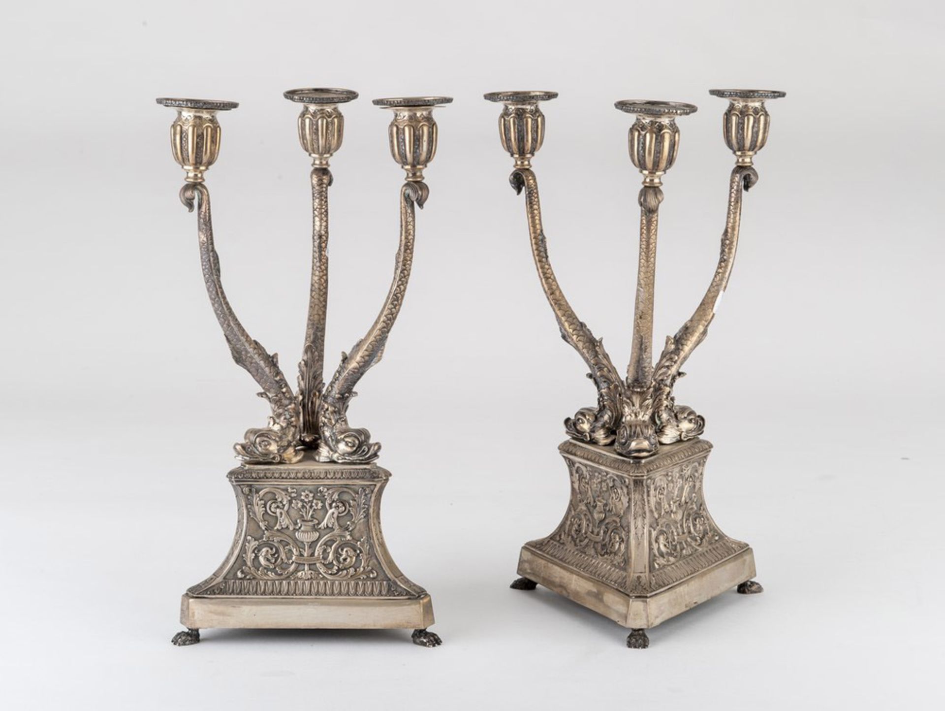 A PAIR OF SILVER CHANDELIERS, PUNCH KINGDOM OF ITALY MILAN 1920/1934 entirely chiseled to grotesque,