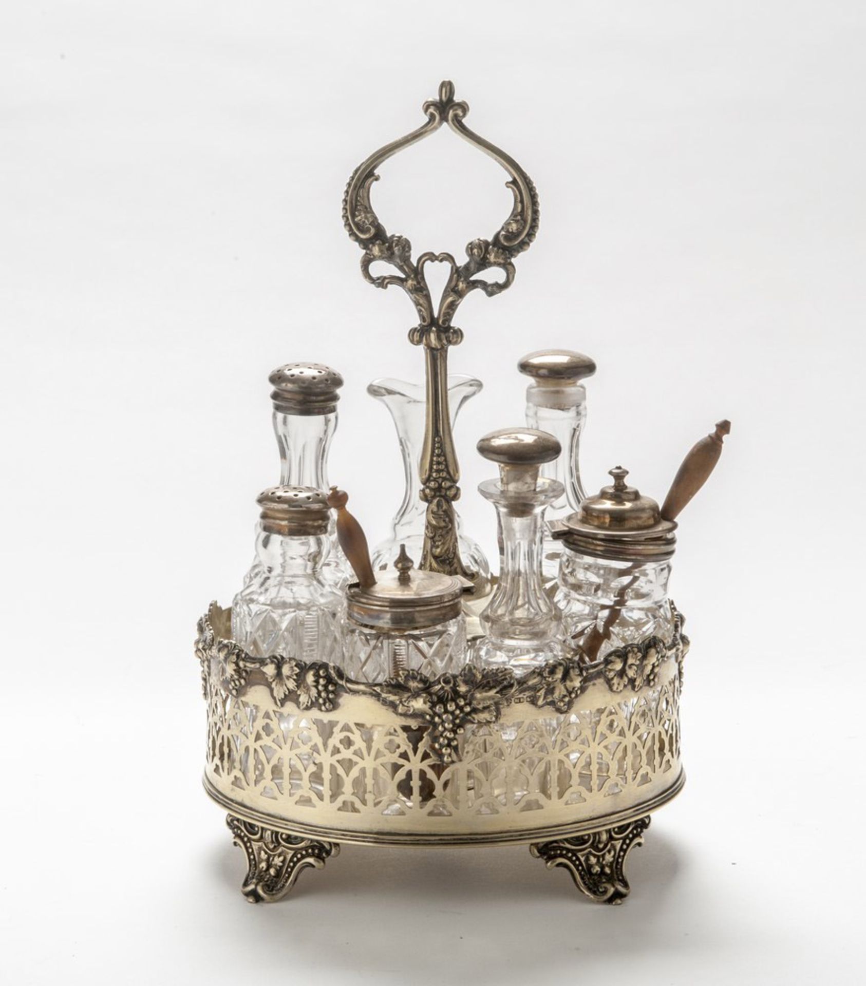 SILVER-PLATED OIL-CRUET, PUNCH SHEFFIELD SECOLO pierced body, with flasks in crystal cut to points