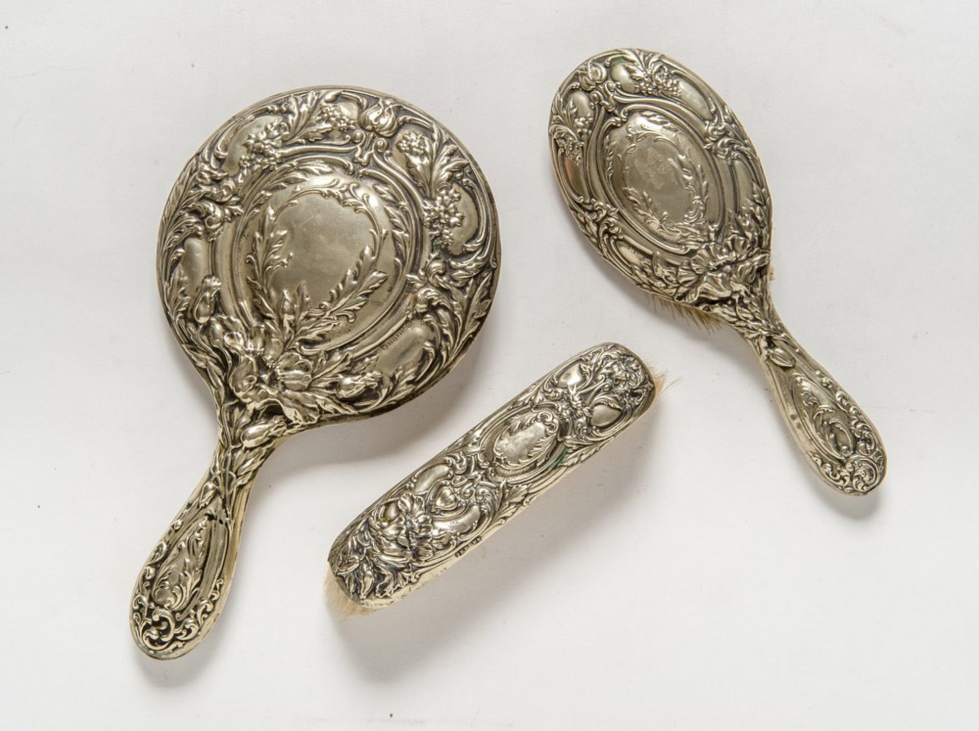 TOILET SET IN SHEFFIELD, PUNCH SHEFFIELD 19TH CENTURY embossed to vegetable motifs and fruits.