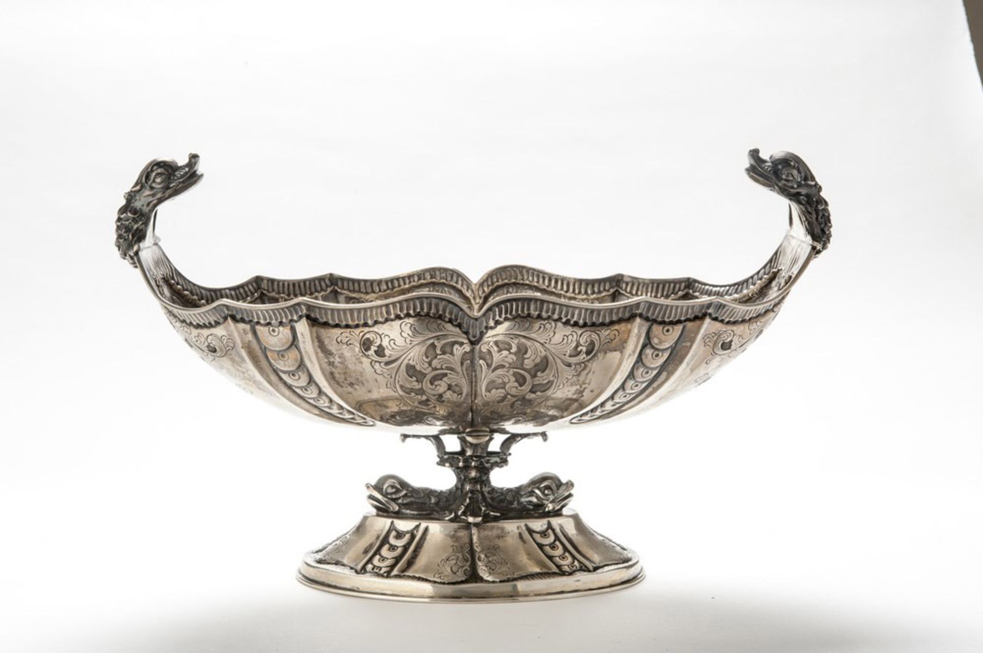 SILVER CENTERPIECE, PUNCH MILAN 1944/1968 chiseled to vegetable motifs and fishes scale, handles