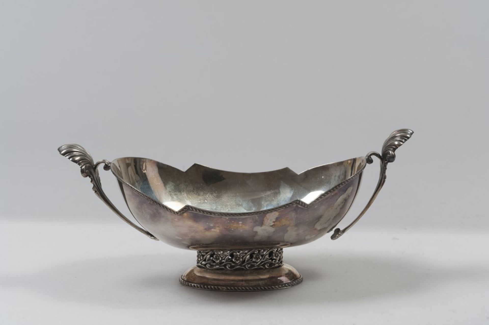 SILVER CENTERPIECE, ITALY 1944/1968 smooth body, with a curved edge, perforated base with floral