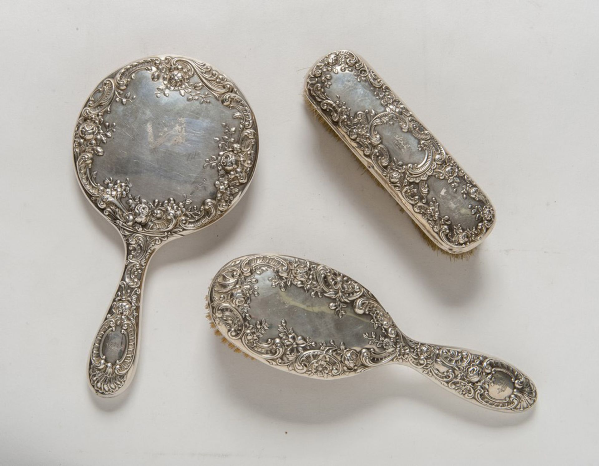 SILVER TOILET SET, PUNCH GORHAM BIRMINGHAM 1912 with rich chisels to vegetable motifs, centered by