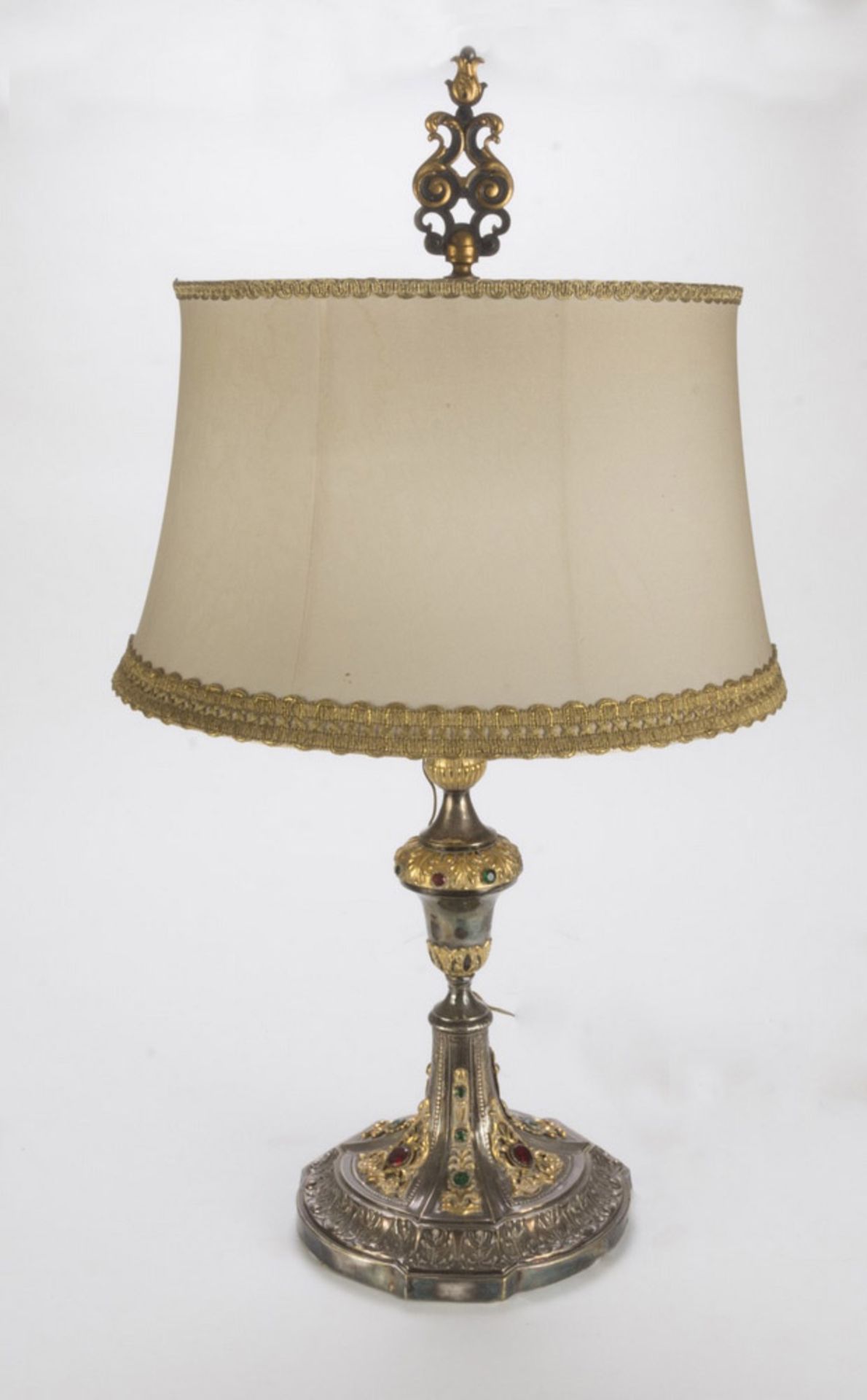 BEAUTIFUL SILVER-PLATED CANDLESTICK, 20TH CENTURY embossed to leaves and pearls with gilt metal