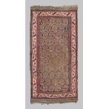 Caucasian carpet Karabagh, early 20th century. Measures cm. 220 x 117. TAPPETO CAUCASICO KARABAGH,