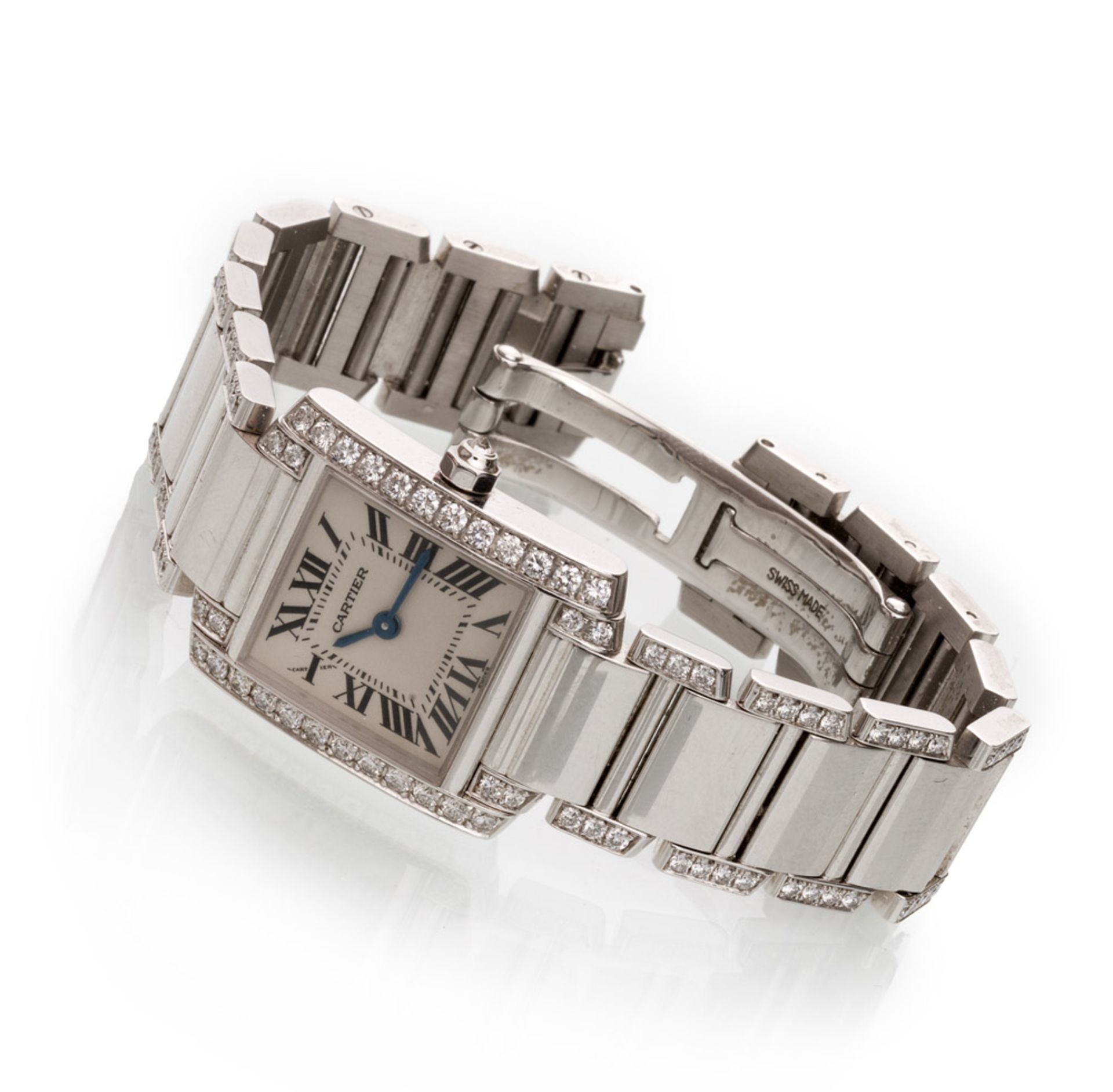 ELEGANTE WOMAN'S WRIST WATCH, BRAND TANK FRANCAISE BY CARTIER entirarely in white gold 18 kt.,