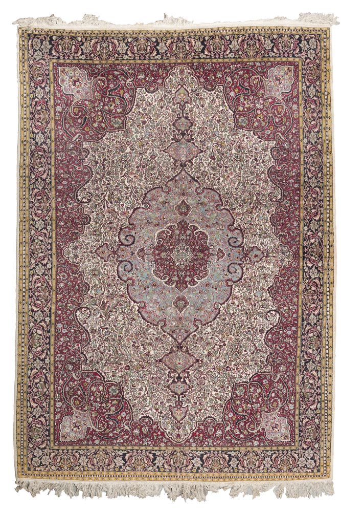 PAKISTAN CARPET, MID-20TH CENTURY drawing Kirman design, medallion with arabesques and shoots of