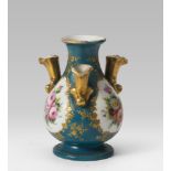 MIGNON PORCELAIN FLOWERVASE, SEVRES EARLY 19TH CENTURY polychrome enamels on turquoise ground,