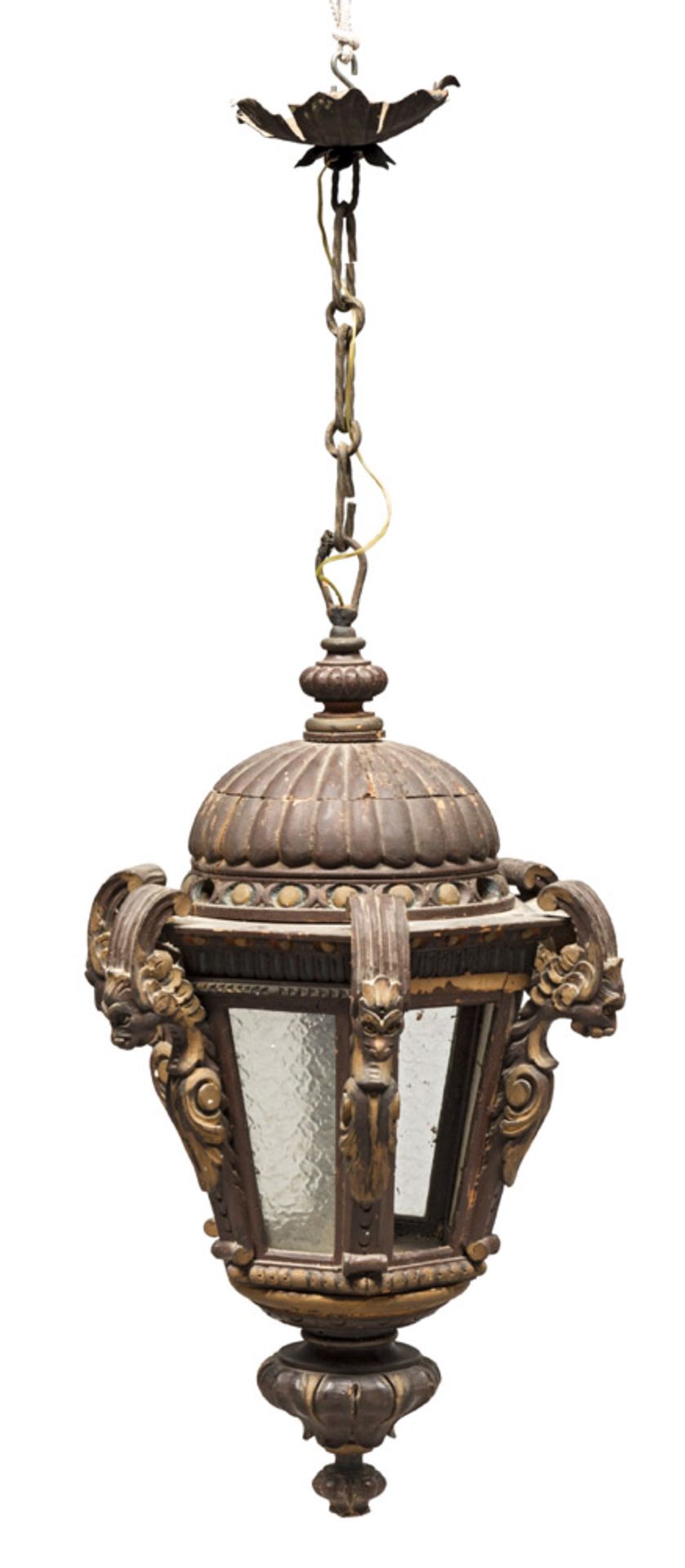 LANTERN IN GRAVEN WOOD, 19TH CENTURY with remains of gilding, with griffons scores. Variegated