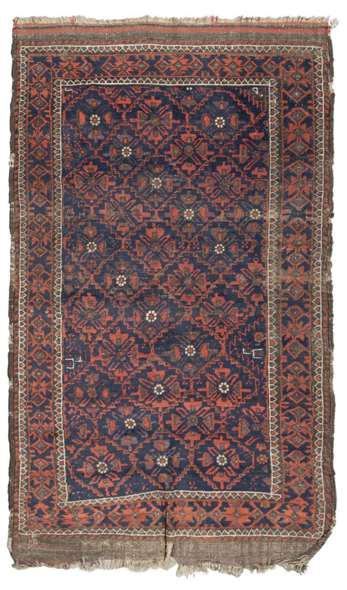 BELUCISTAN CARPET, EARLY 20TH CENTURY with modular patterns of flowers and claws, in the center