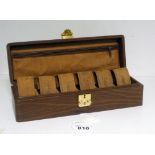 SIX LEATHER WATCH CASES, 20TH CENTURY with leather box. Measures box cm. 8 x 29 x 10. SEI