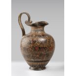 ORIENTALIZING STYLE OINOCHOE, EARLY 20TH CENTURY brown and red painted clay. three-lobed rim with