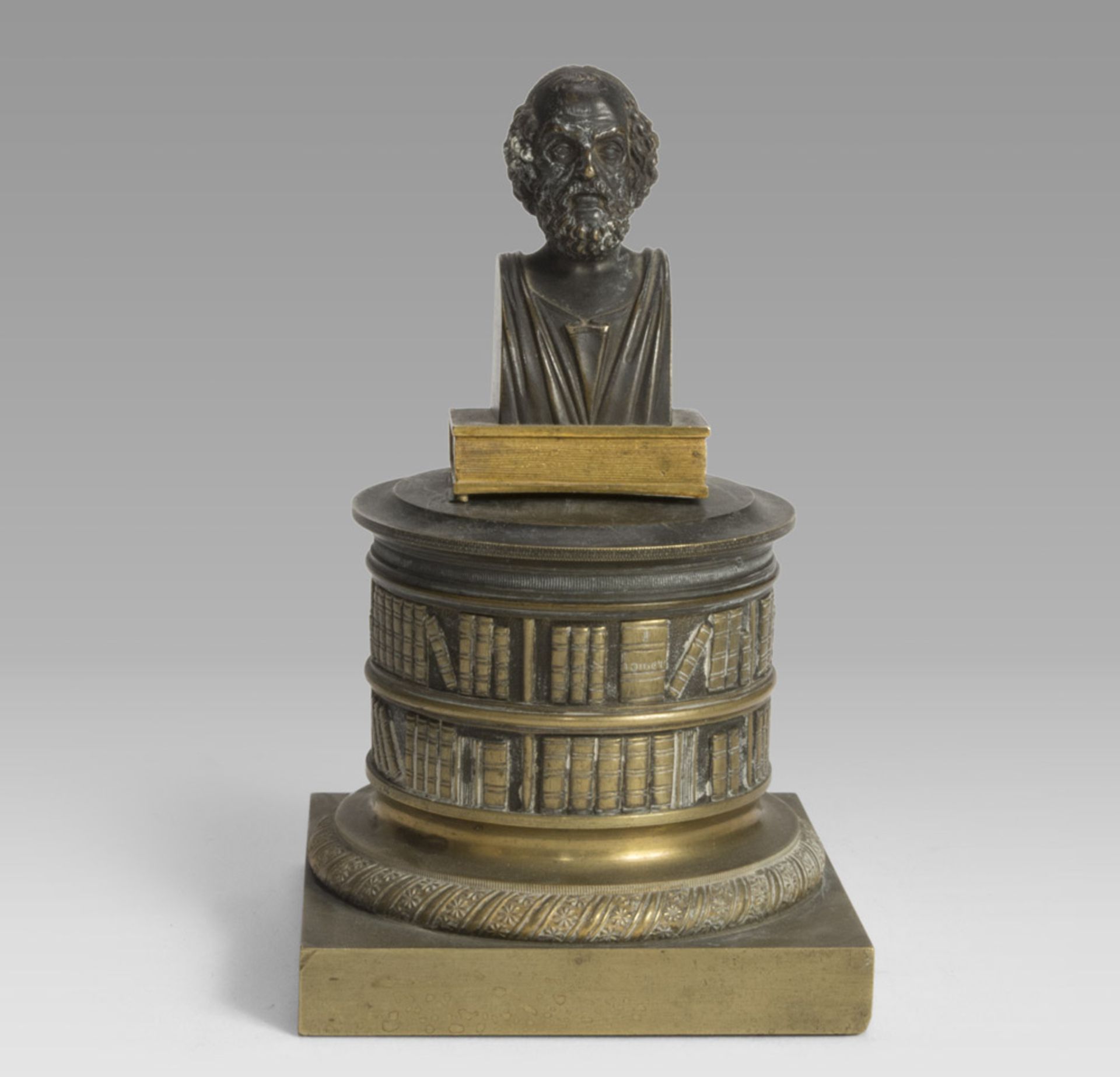 MIGNON BUST IN BURNISHED BRONZE, EARLY 19TH CENTURY representing Philosopher. Circular basement in