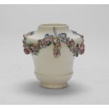 SMALL PORCELAIN VASE, PROBABLY FRANCE LATE 18TH CENTURY of white enamel and polychromy, decorated