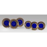 ELEVEN SAUCERS IN COBALT GLASS, VENICE EARLY 20TH CENTURY of three dimensions, with edge in gold
