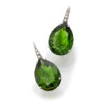 PAIR OF EARRINGS in white gold 18 kts., decorated with semi-precious green stone cut to drop,