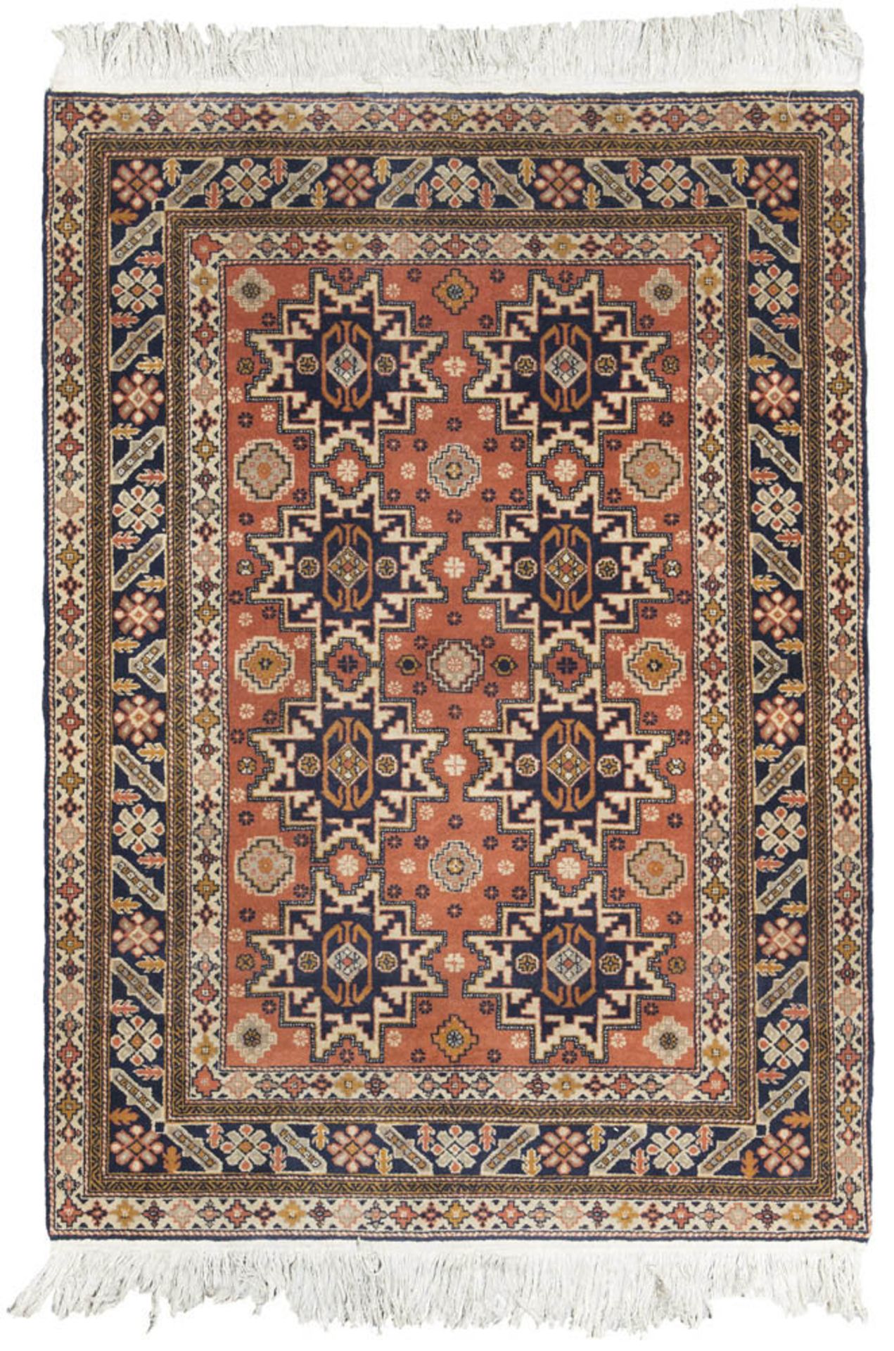 SHIRWAN LESGHI CARPET, 20TH CENTURY with design of sequence of stars and secondary motifs to
