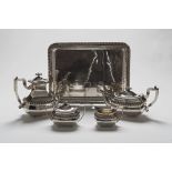 SILVER-PLATED TEA SERVICE, 20TH CENTURY with fluted edges and separators in bone. Consisting of
