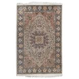 PERSIAN RUG KUM, SECOND HALF OF 20TH CENTURY with branches of flowers, leaves, herati, in the