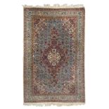 PERSIAN YOZAN CARPET, MID 20TH CENTURY with big central medallion on red ground and white and