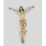 IVORY CHRIST, ITALY LATE 18TH CENTURY with lacquered hair and beard. Mobile arms. Measures cm. 30